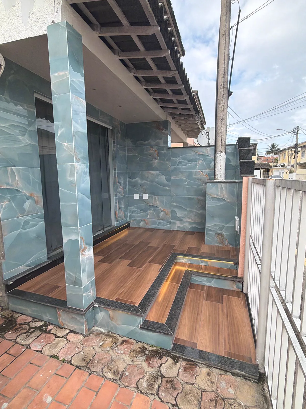 Reforma residencial com acabamento de área externa
